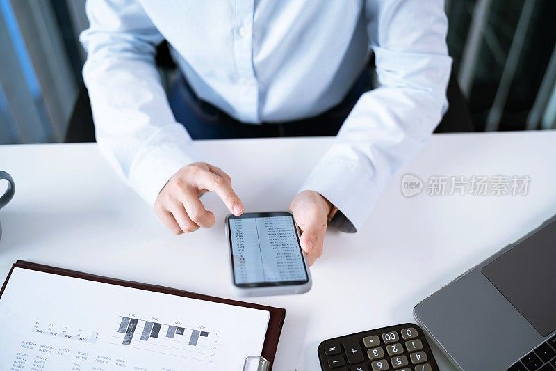 Business people holding Smartphone working mobile devices. cell telephone technology e-commerce concept